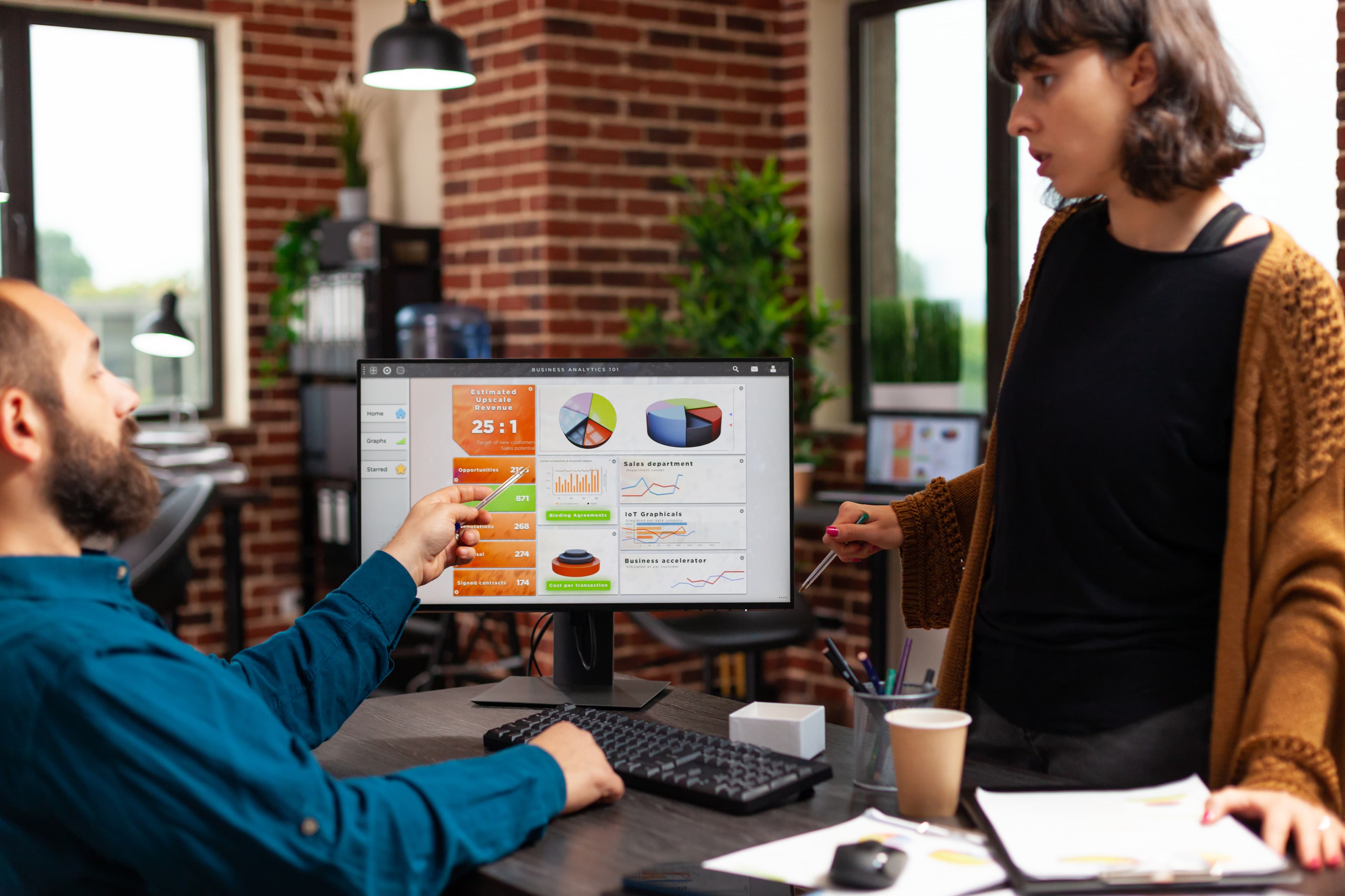 Team reviewing SEO and marketing strategy charts
